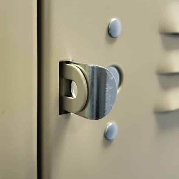 Pull handle includes built-in padlock loop to secure the door closed.
